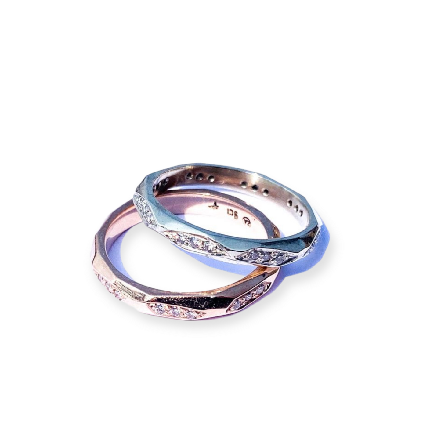 Solid gold and diamond love band