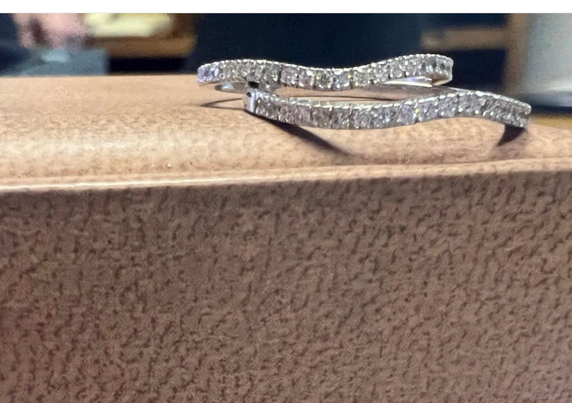 Curved diamond eternity rings