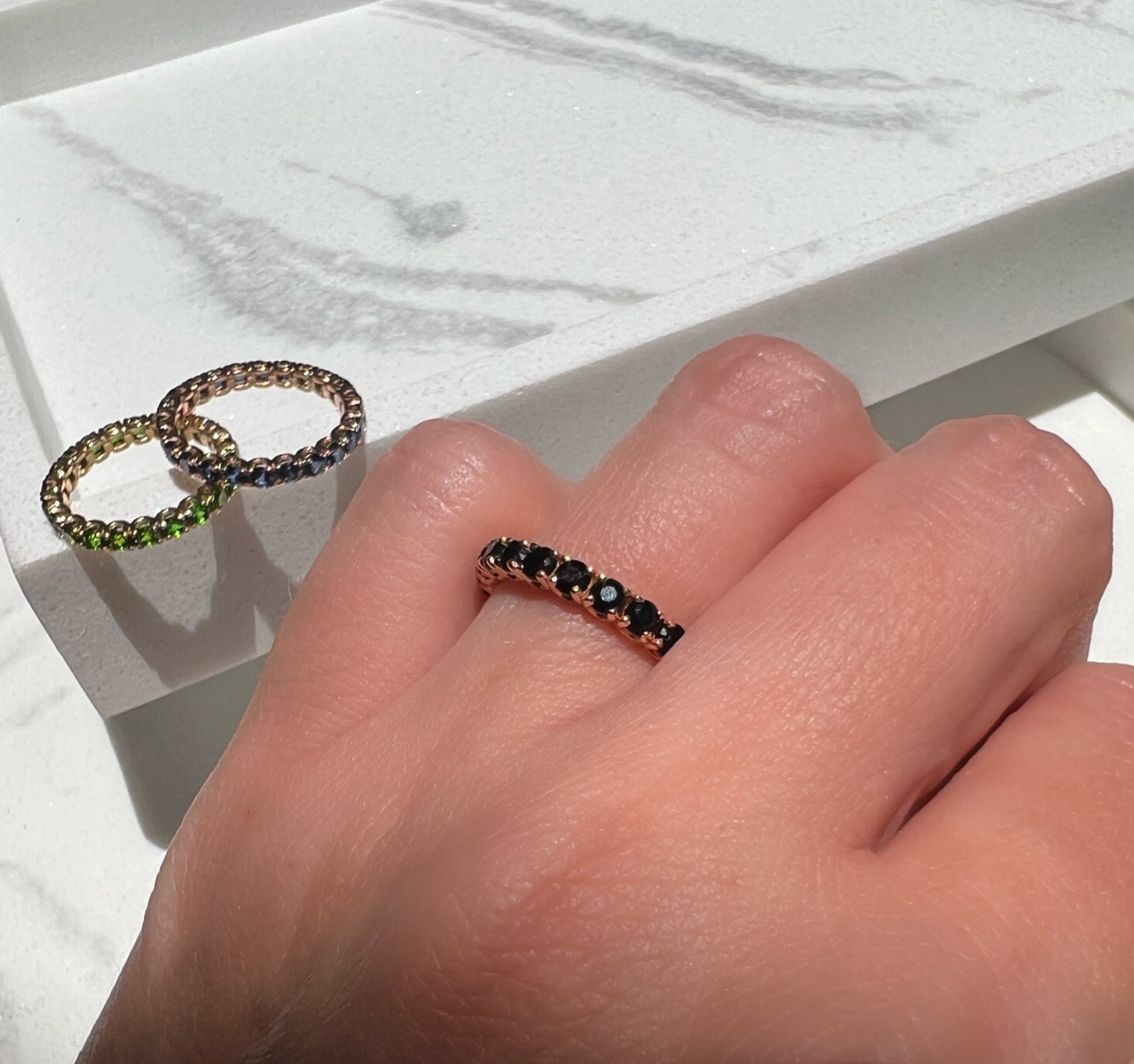 Black onyx and gold eternity ring