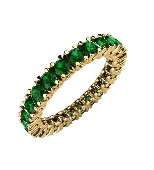 Green and gold eternity ring