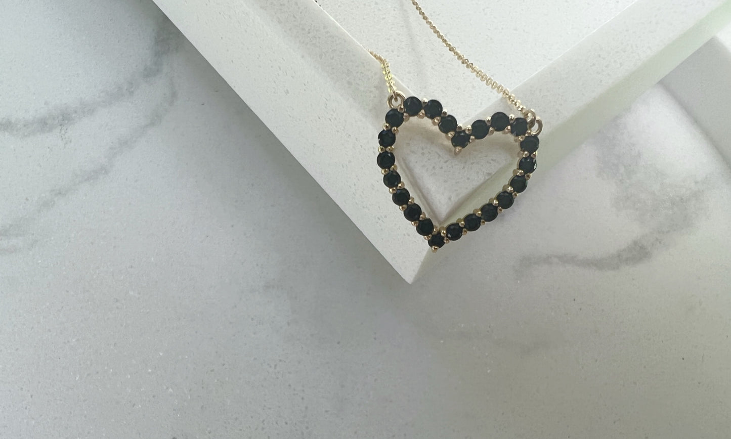 Gold and black onyx heart necklace